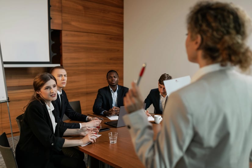 Finance professionals discussing guide