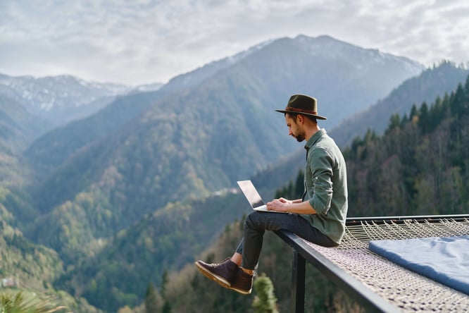 Man working remotely in a foreign country.